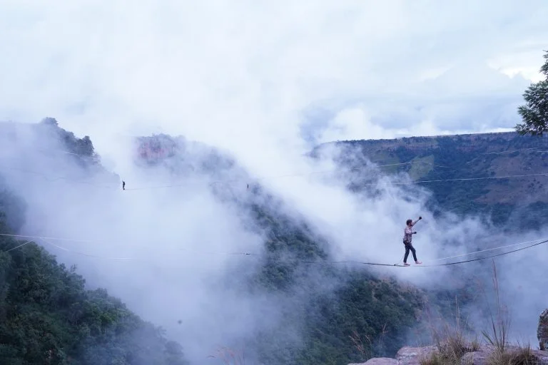 three highliners walk at Mayhem Mountain Festival