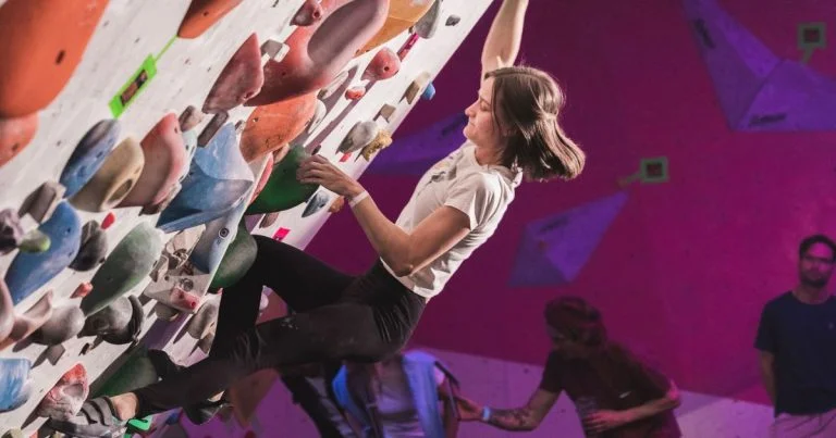 Woman climbing Tjoms in Arms