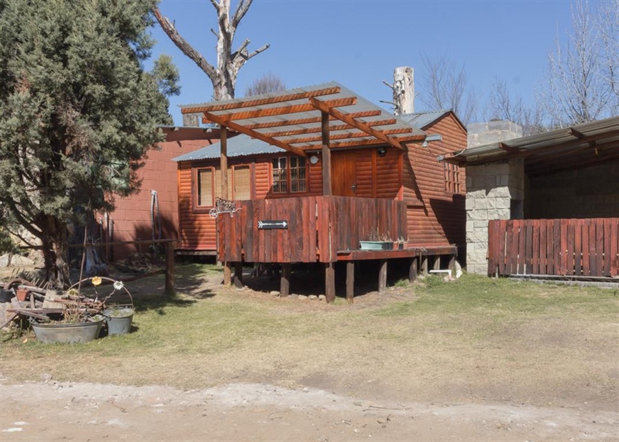 Wooden cabins with covered decks