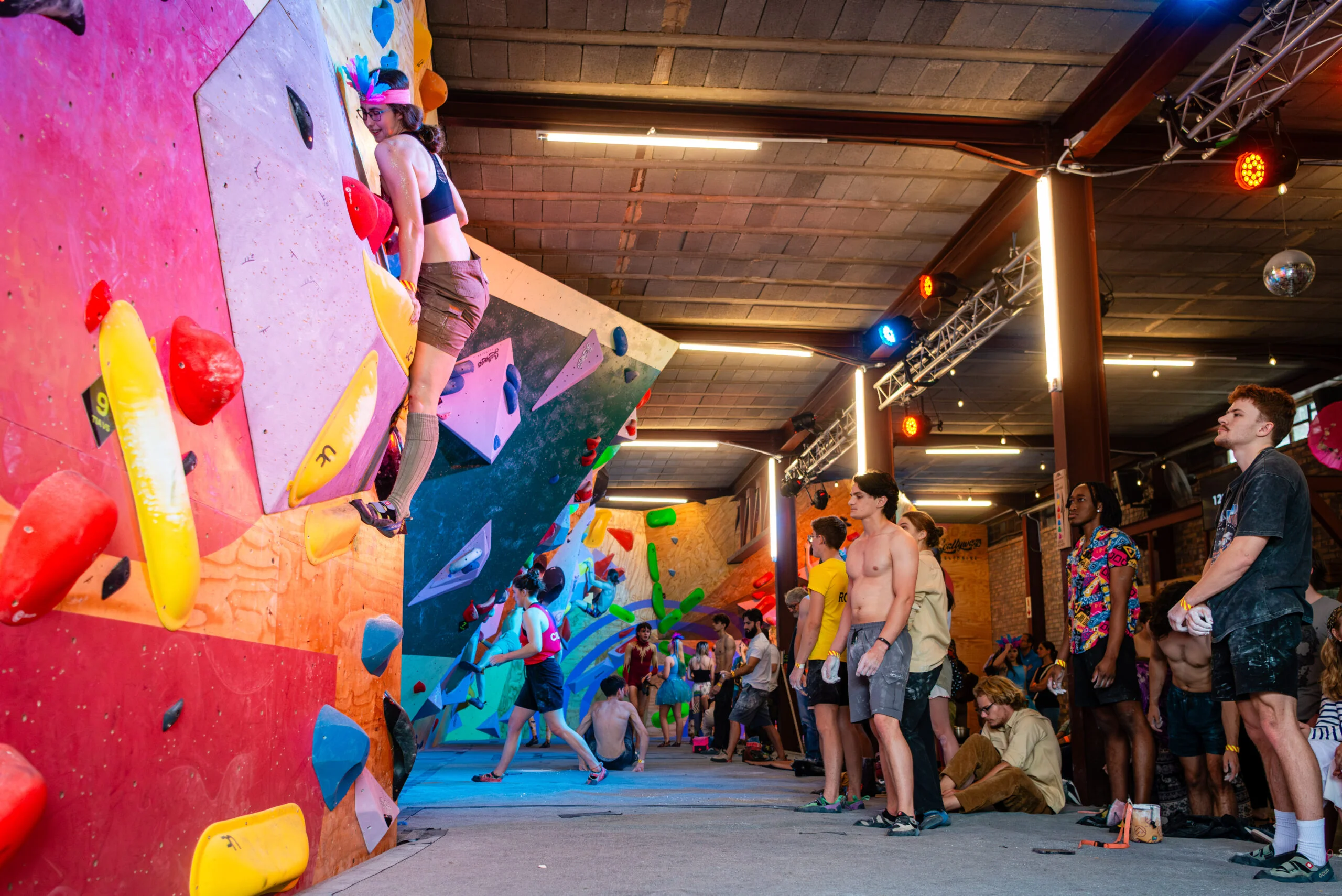 Climbers on the wall at Friends & Allies
