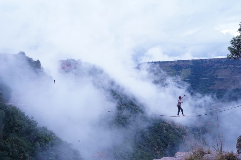 three highliners walk at Mayhem Mountain Festival